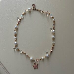 Elegant Pearl and Gold Starfish Necklace
